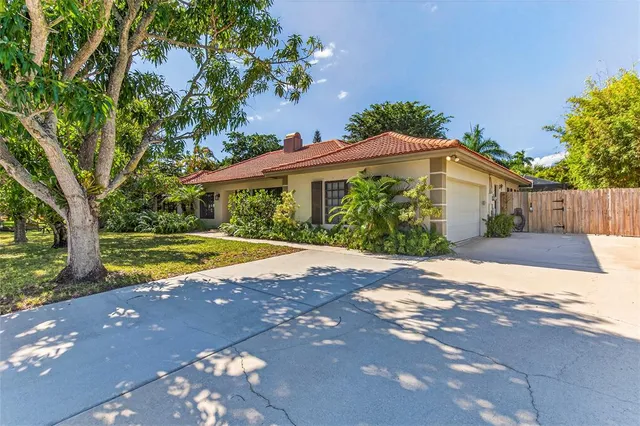 a kitchen with white cabinets