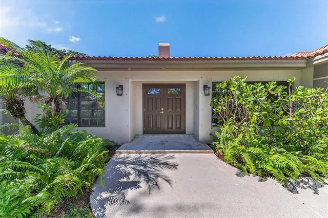 a large kitchen with stainless steel appliances granite countertop a sink and a stove