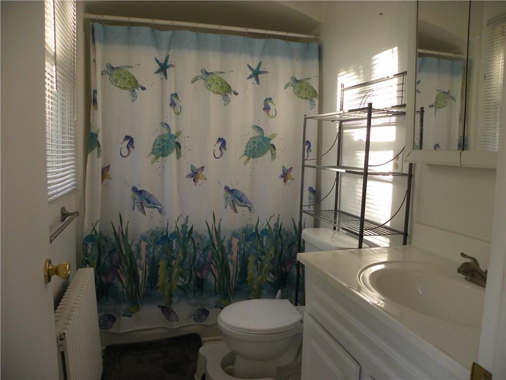 549 State Street Baden, PA 15005 - Photo 15 of 21 a bathroom with a sink a toilet and shower