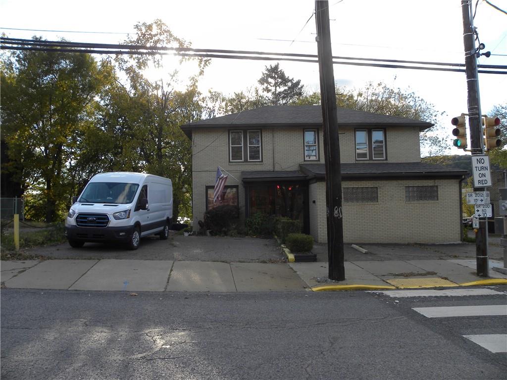 549 State Street Baden, PA 15005 - Photo 2 of 21 a car parked on the side of a street