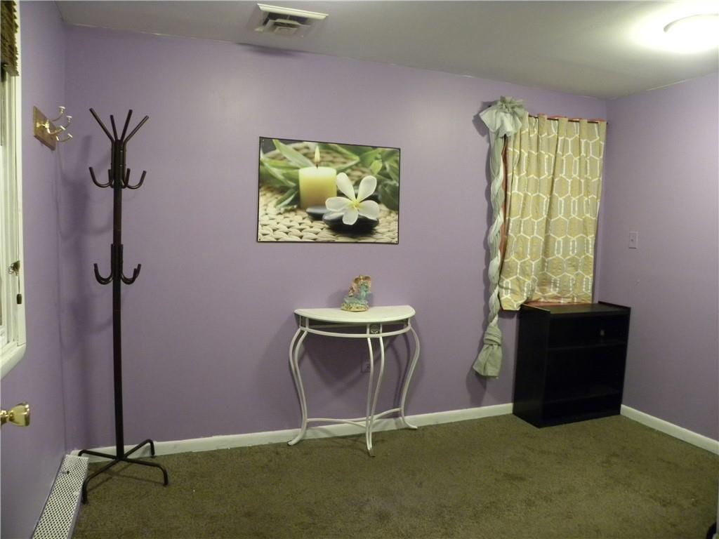 549 State Street Baden, PA 15005 - Photo 5 of 21 a room with window and flower pot