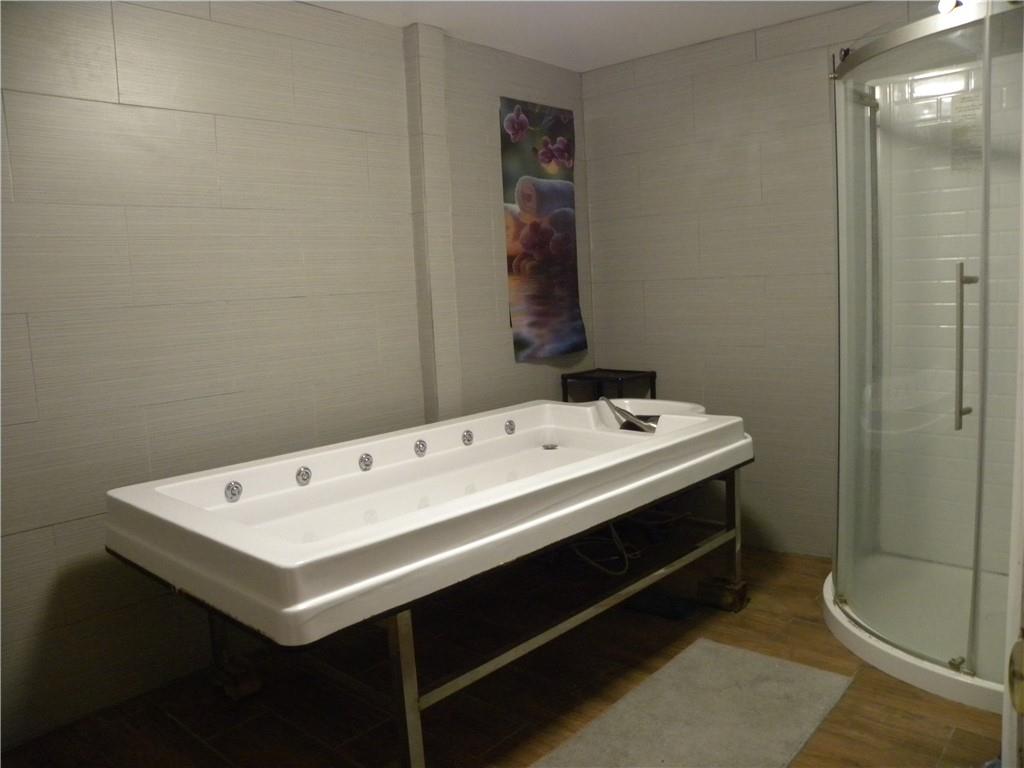 549 State Street Baden, PA 15005 - Photo 6 of 21 a utility room with a sink a toilet and shower