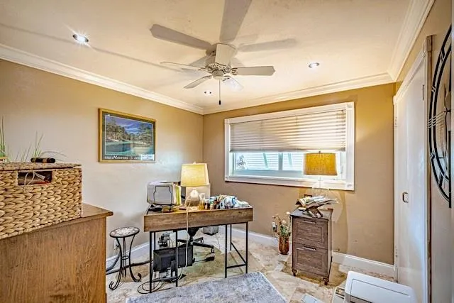 a workspace with furniture and window