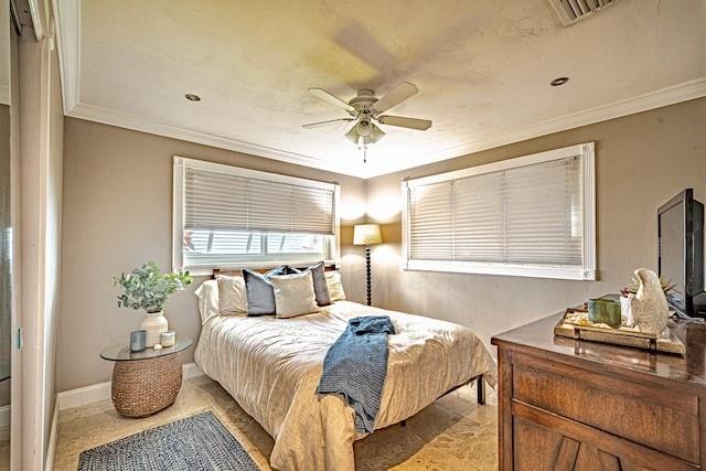 1131 Southeast 5th Avenue Pompano Beach, FL 33060 - Photo 21 of 39 a bedroom with a bed and a chandelier