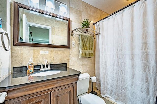 1131 Southeast 5th Avenue Pompano Beach, FL 33060 - Photo 25 of 39 a bathroom with a sink a mirror a toilet and a window