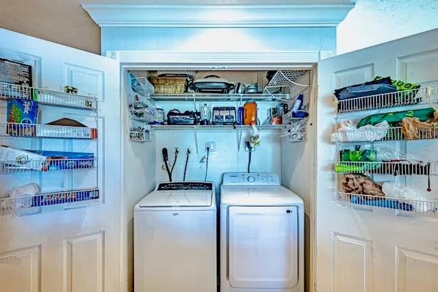 a storage room with washer and lots of storage