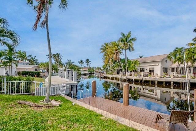 1131 Southeast 5th Avenue Pompano Beach, FL 33060 - Photo 32 of 39 a view of a house with a yard and potted plants