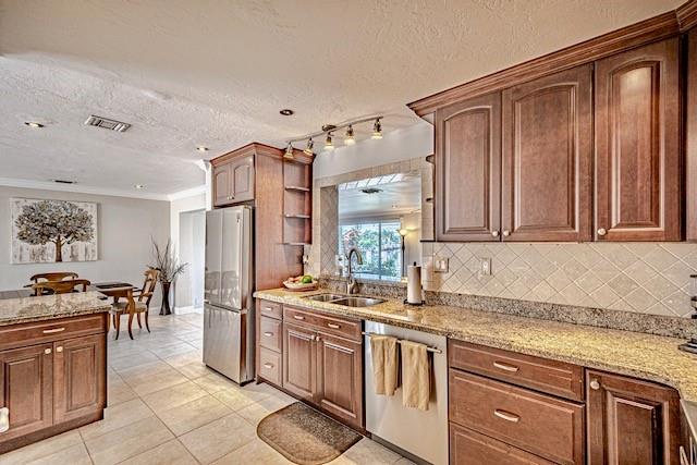 1131 Southeast 5th Avenue Pompano Beach, FL 33060 - Photo 10 of 39 a kitchen with stainless steel appliances granite countertop a sink stove and cabinets