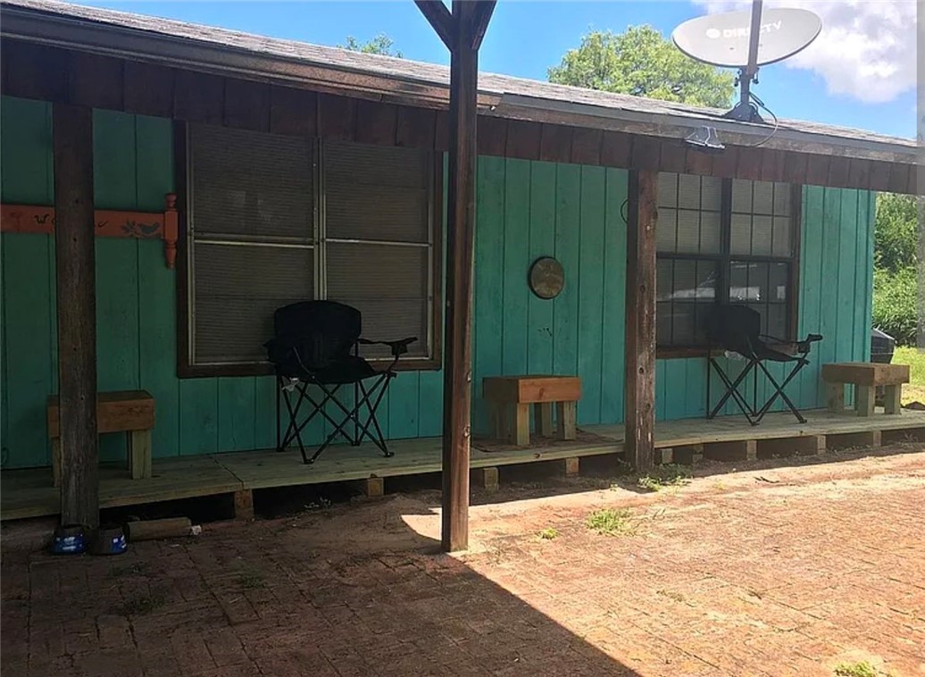 a backyard of a house with seating space