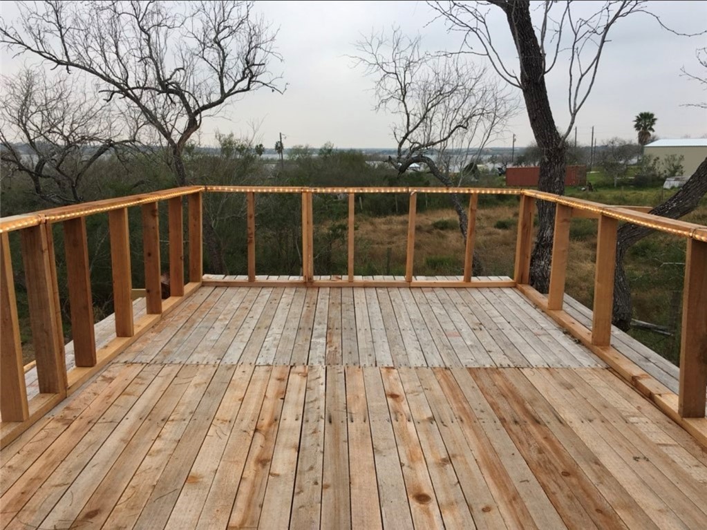 49 Bayview Drive Mathis, TX 78368 - Photo 14 of 20 a view of wooden deck