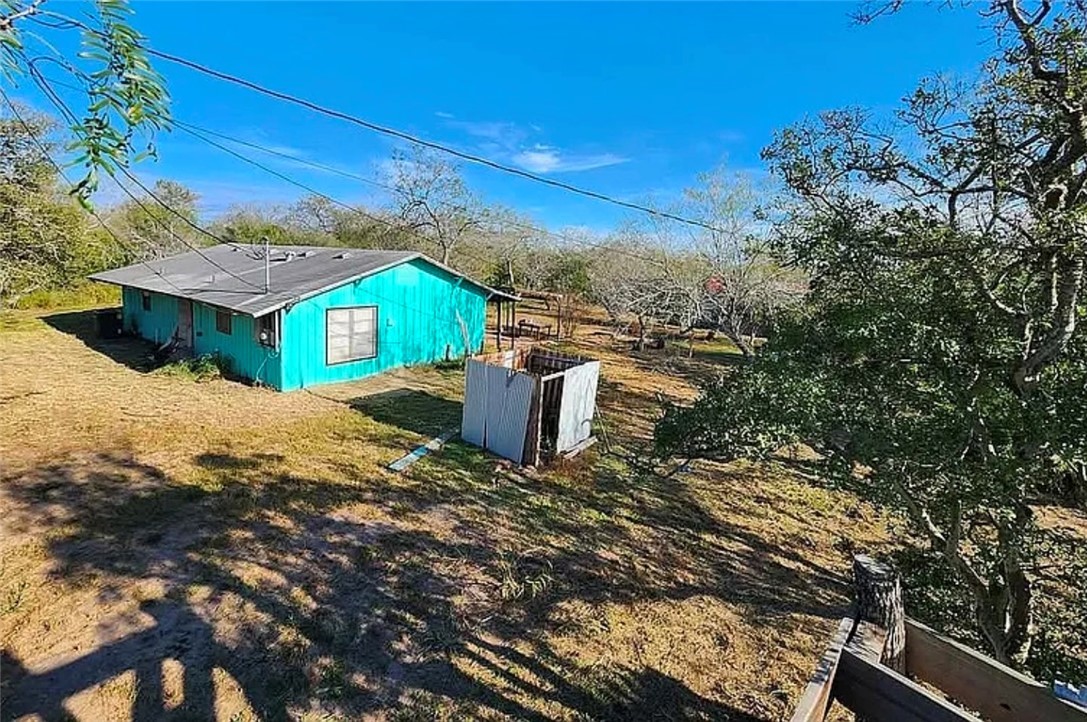 49 Bayview Drive Mathis, TX 78368 - Photo 18 of 20 a view of a house with a yard