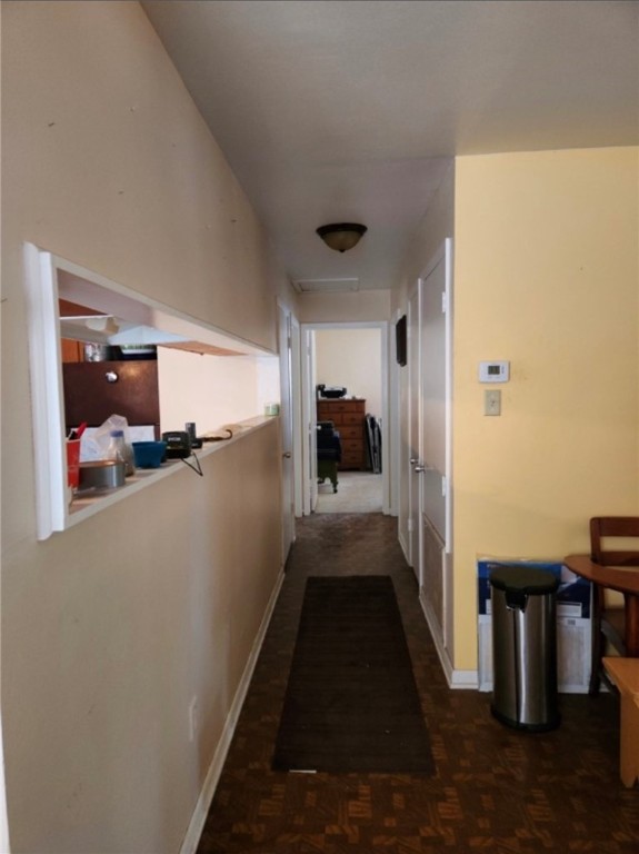 49 Bayview Drive Mathis, TX 78368 - Photo 5 of 20 a view of a hallway with a dining room and stairs