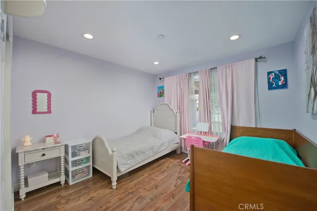 a bedroom with a bed and a closet