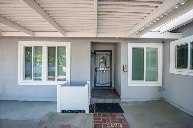 a view of a room with a large window