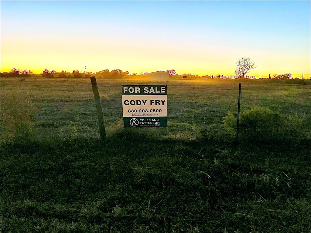 8573 Loop Road Bellville, TX 77418 - Photo 8 of 10 a view of a street with an ocean view