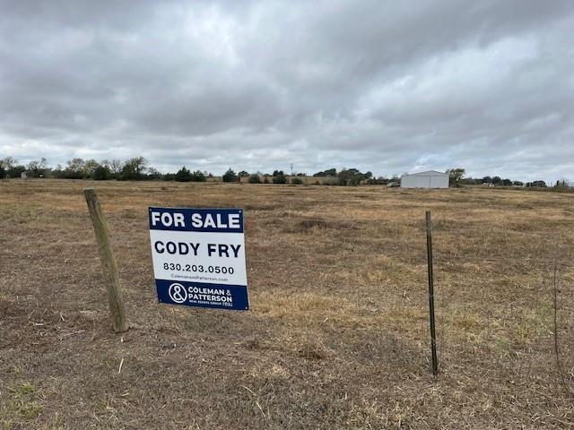 8573 Loop Road Bellville, TX 77418 - Photo 9 of 10 a sign board with a lake view