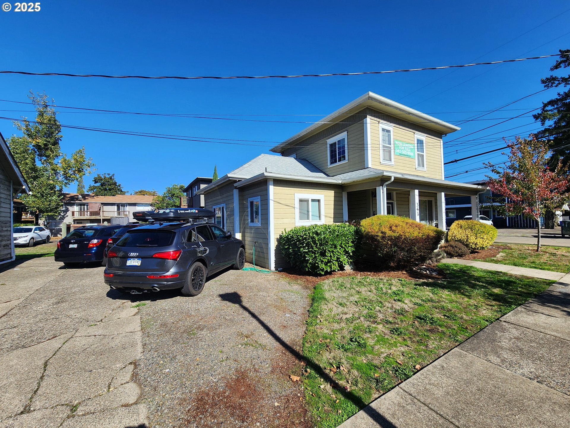 1591 High Street Eugene, OR 97401 - Photo 2 of 4 a car parked in front of a house