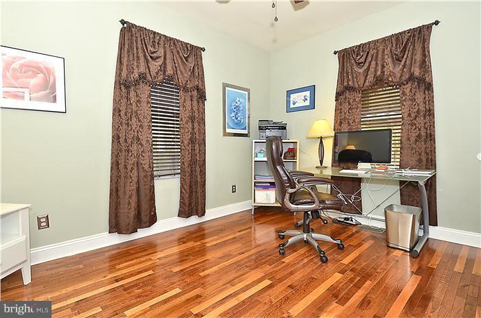 310 West Glebe Road Alexandria, VA 22305 - Photo 17 of 22 a view of a workspace with furniture and a window