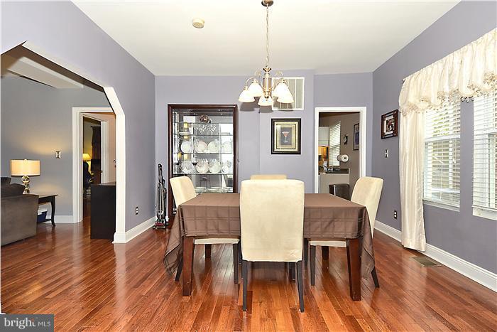 310 West Glebe Road Alexandria, VA 22305 - Photo 5 of 22 a view of a dining room with furniture window and wooden floor