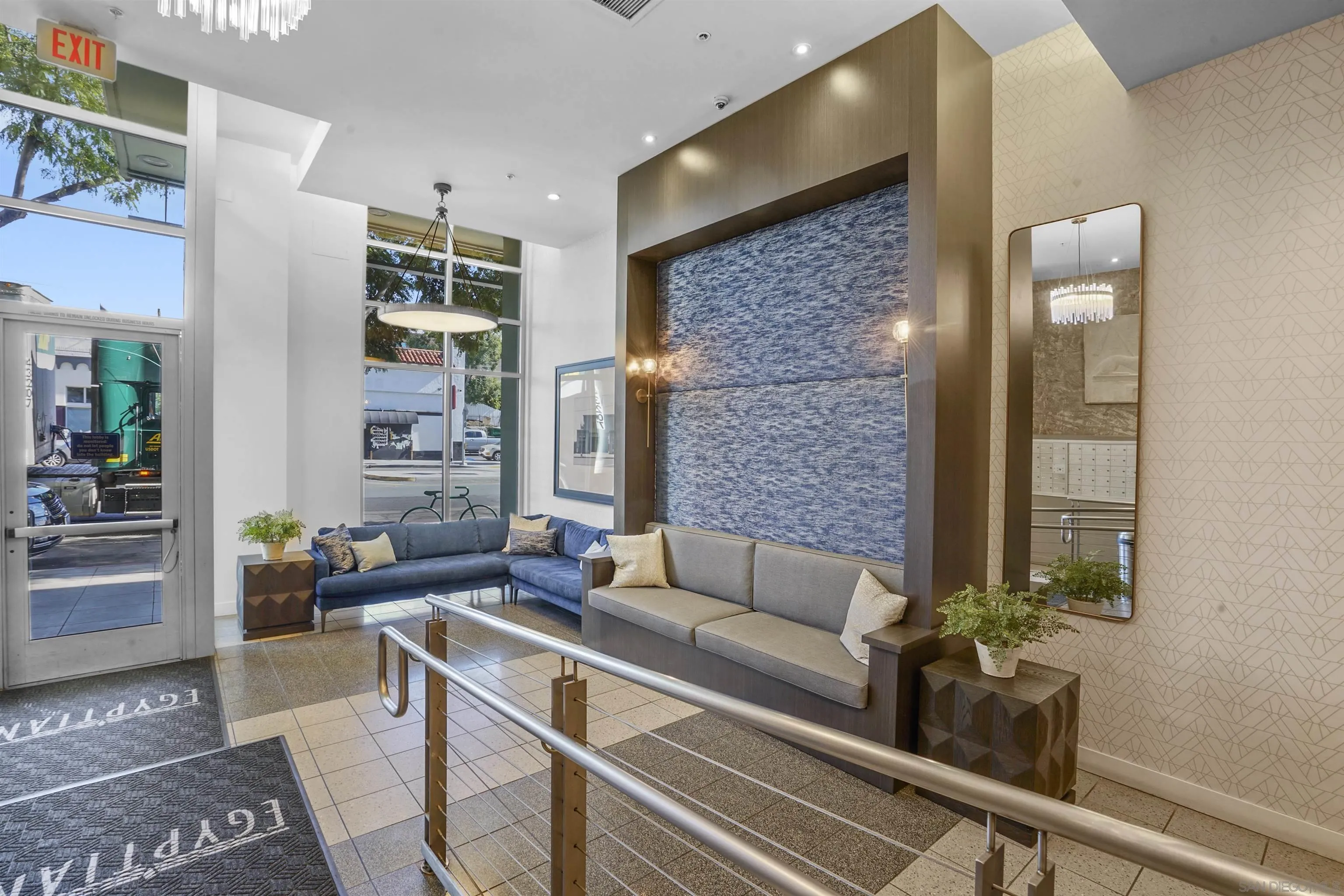 3812 Park Boulevard, Unit 503 San Diego, CA 92103 - Photo 25 of 27 a living room with furniture and a potted plant