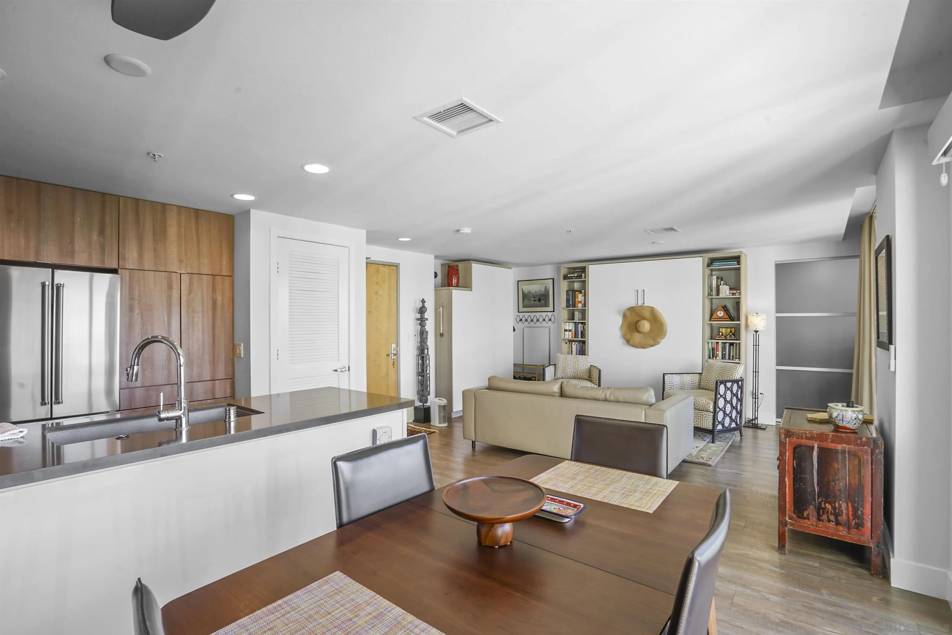 3812 Park Boulevard, Unit 503 San Diego, CA 92103 - Photo 4 of 27 a living room with furniture and a large window