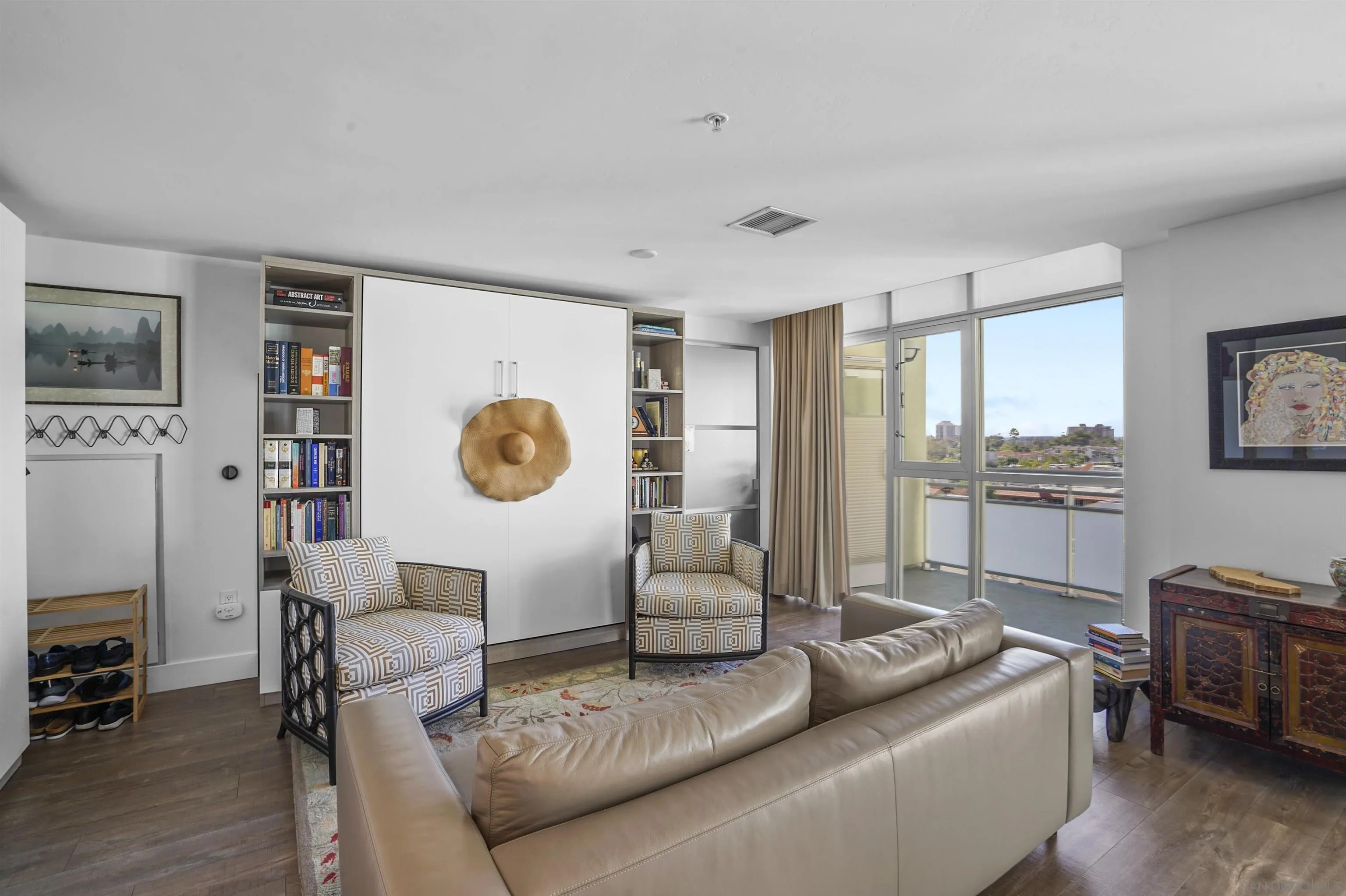 3812 Park Boulevard, Unit 503 San Diego, CA 92103 - Photo 8 of 27 a living room with furniture and a large window