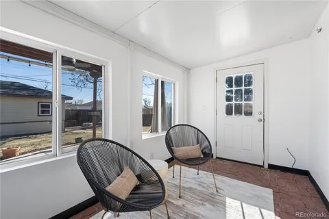 a view of a livingroom with furniture
