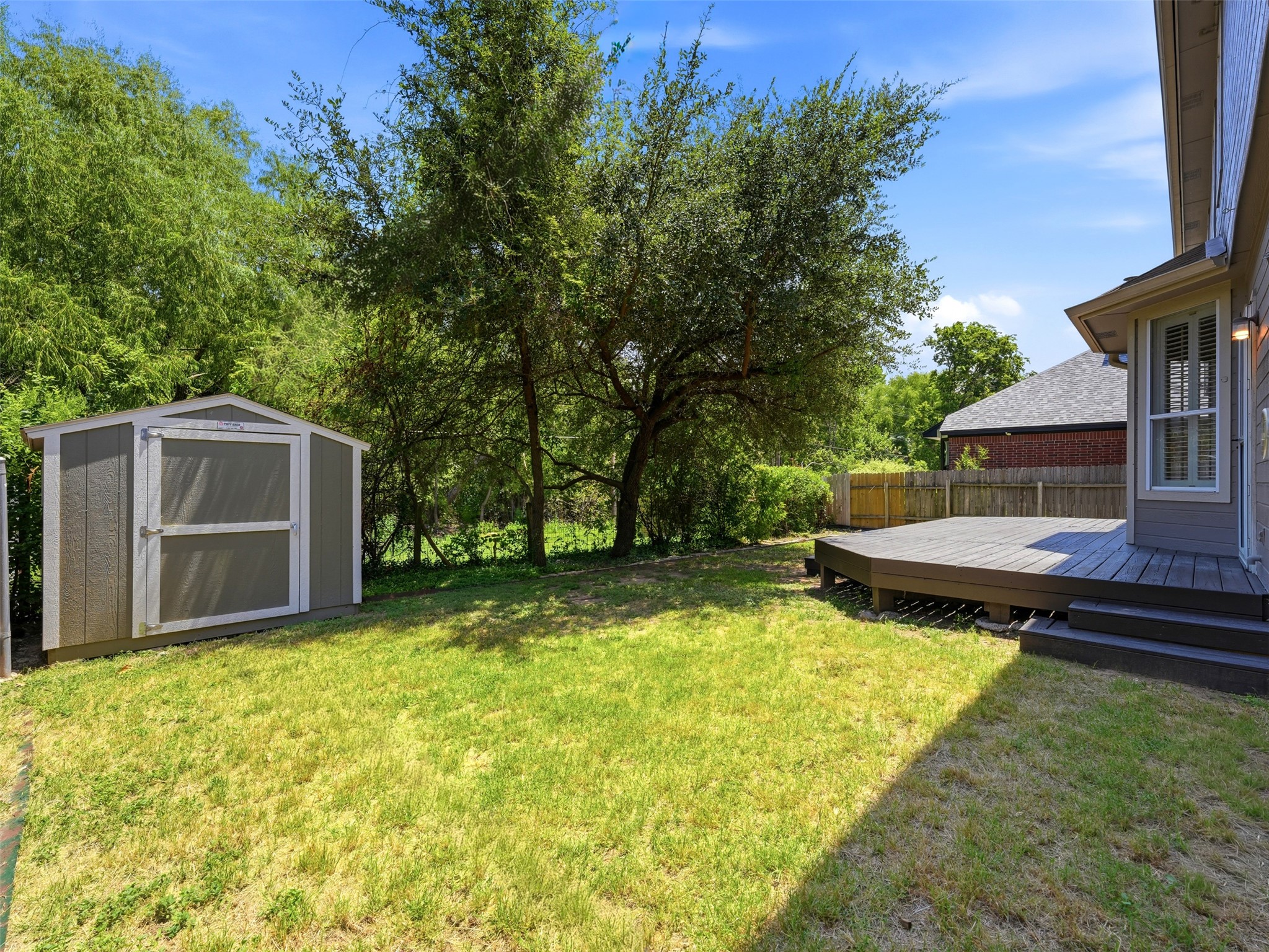 The backyard is your peaceful, private outdoor oasis with nothing but the greenbelt and preserved treeline behind the home and the option of pushing your fence line back further as your yard continues well past.