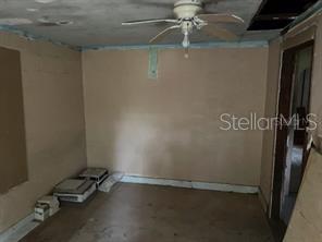 1603-1605 Rose Lane Eustis, FL 32726 - Photo 8 of 14 wooden floor in an empty room