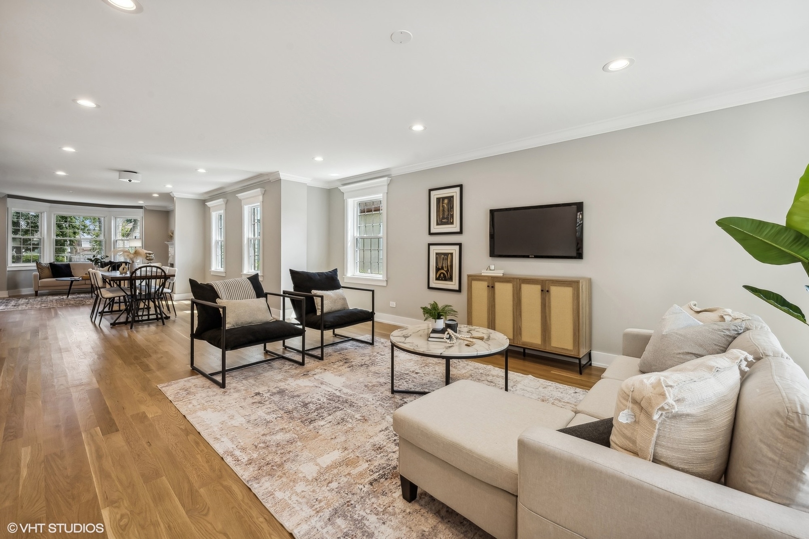 Undisclosed Address Elmhurst, IL 60126 - Photo 17 of 53 a living room with furniture and a flat screen tv