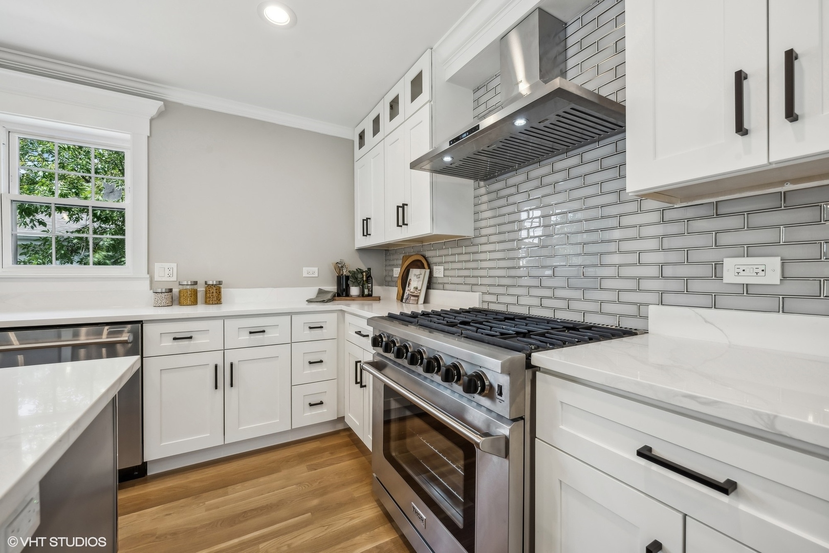 Undisclosed Address Elmhurst, IL 60126 - Photo 20 of 53 a kitchen with granite countertop a stove sink and cabinets