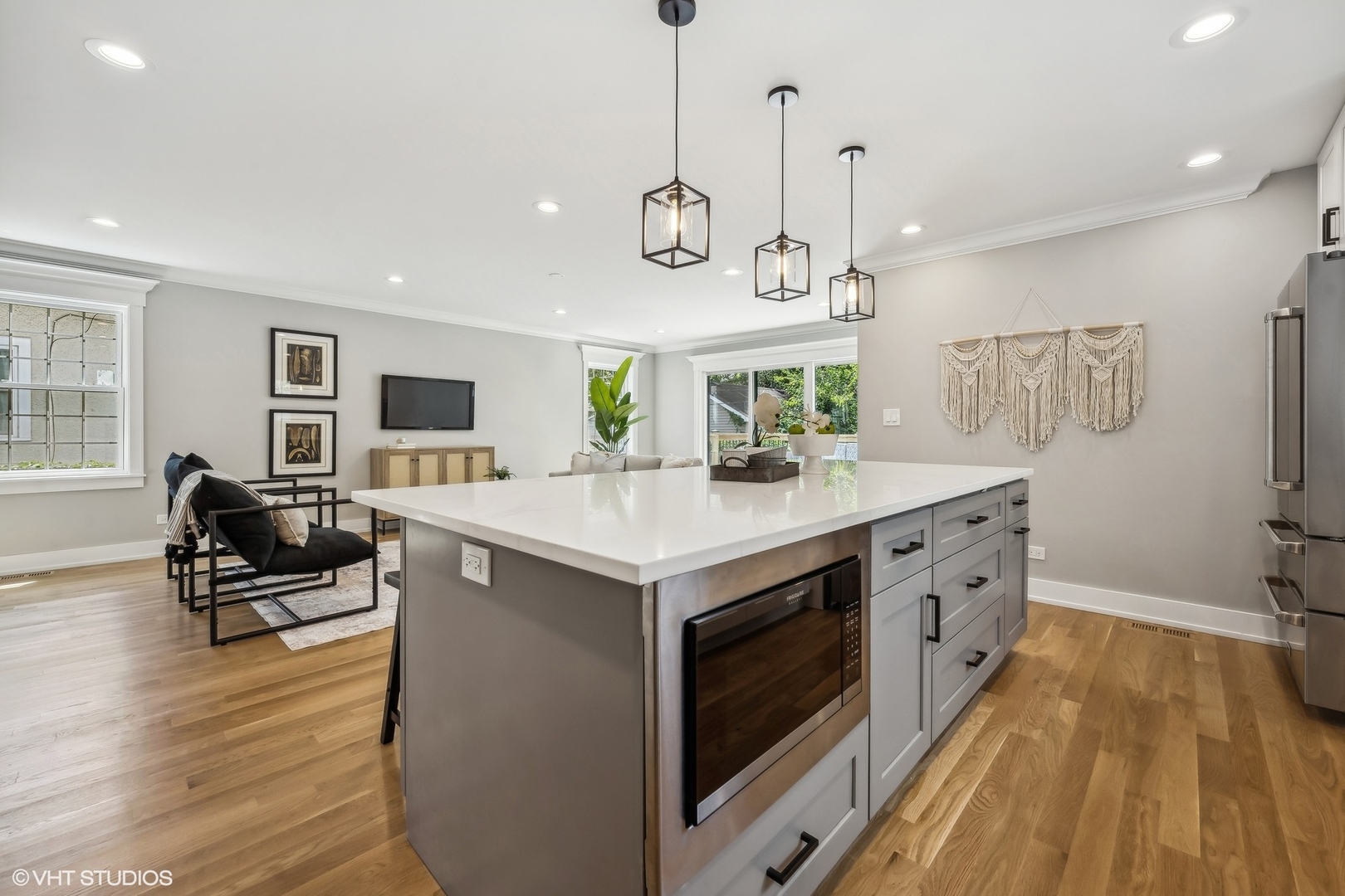 Undisclosed Address Elmhurst, IL 60126 - Photo 22 of 53 a kitchen with stainless steel appliances granite countertop a stove and a wooden floors