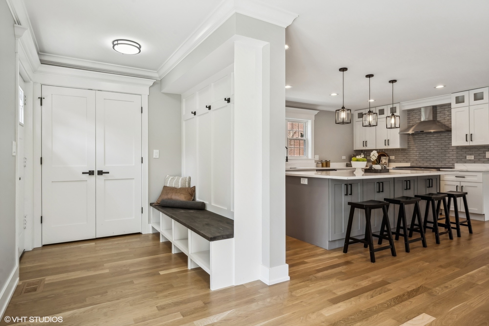 Undisclosed Address Elmhurst, IL 60126 - Photo 25 of 53 a kitchen with kitchen island granite countertop a sink cabinets and wooden floor