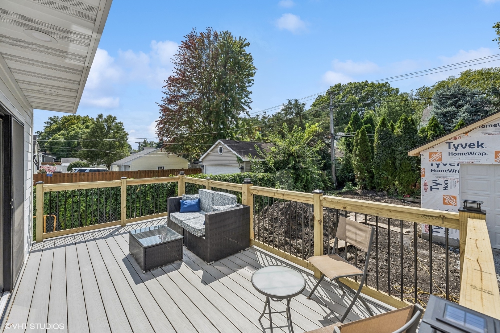 Undisclosed Address Elmhurst, IL 60126 - Photo 27 of 53 a view of a deck with wooden floor and outdoor seating