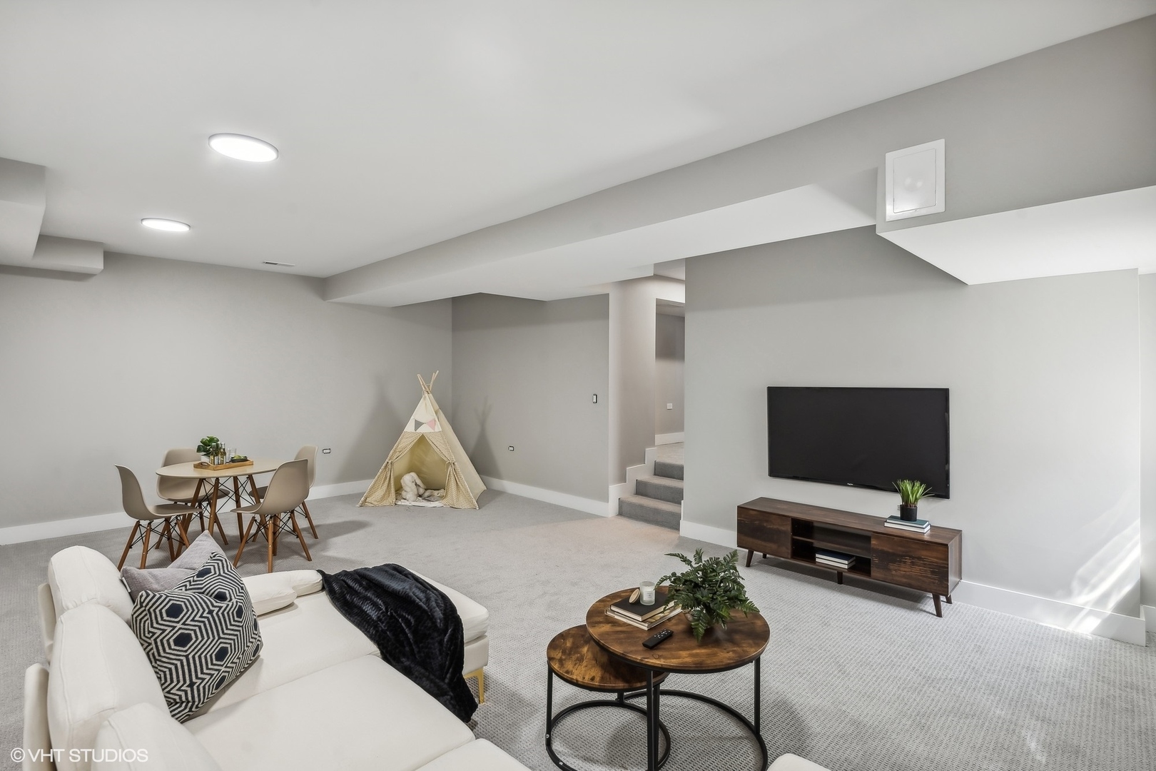 Undisclosed Address Elmhurst, IL 60126 - Photo 36 of 53 a living room with furniture and a flat screen tv