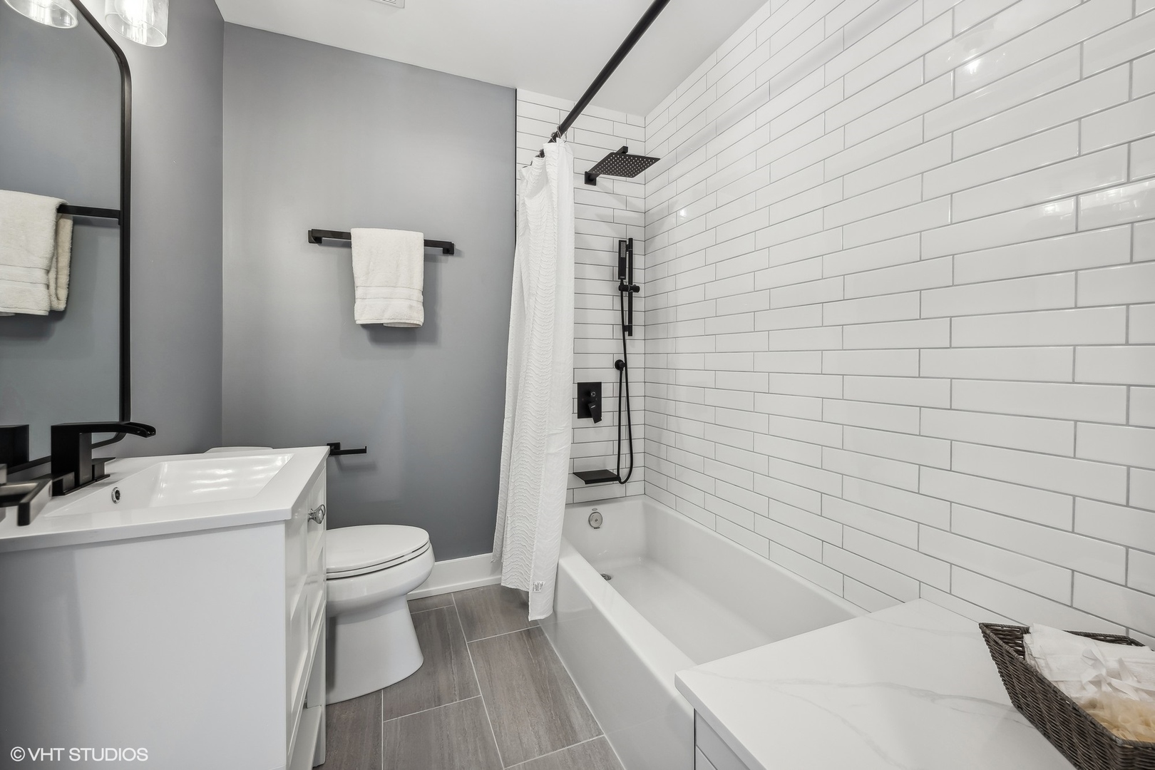 Undisclosed Address Elmhurst, IL 60126 - Photo 39 of 53 a bathroom with a sink a toilet and shower