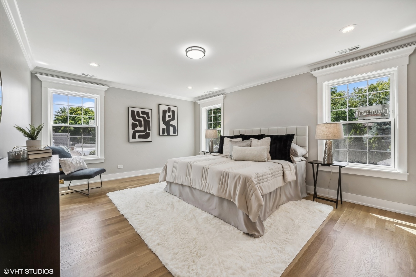 Undisclosed Address Elmhurst, IL 60126 - Photo 44 of 53 a bedroom with a large bed and a couch