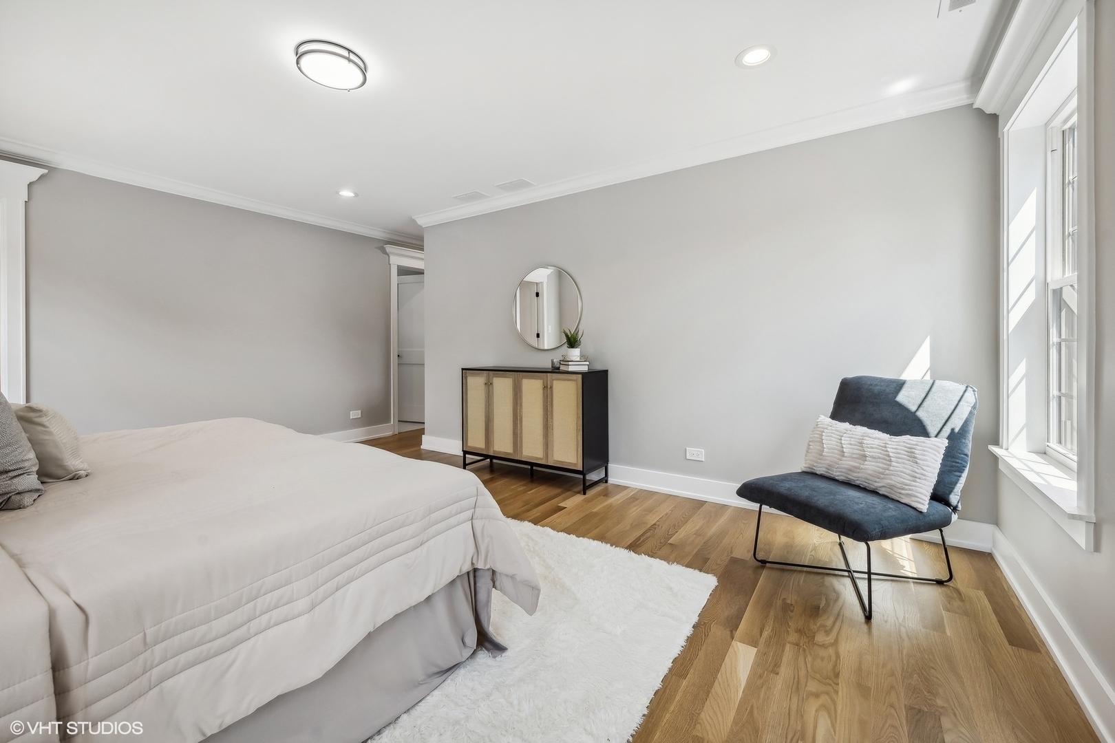 Undisclosed Address Elmhurst, IL 60126 - Photo 46 of 53 a bedroom with a bed and a chair