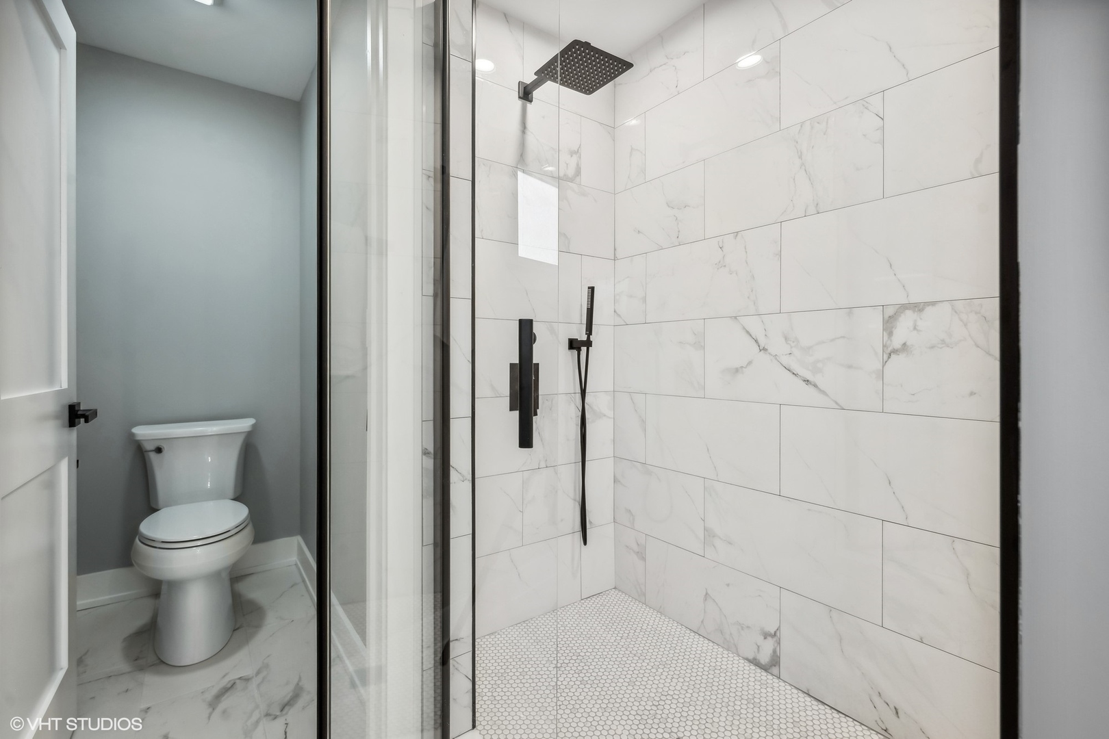 Undisclosed Address Elmhurst, IL 60126 - Photo 47 of 53 a bathroom with a toilet and a shower