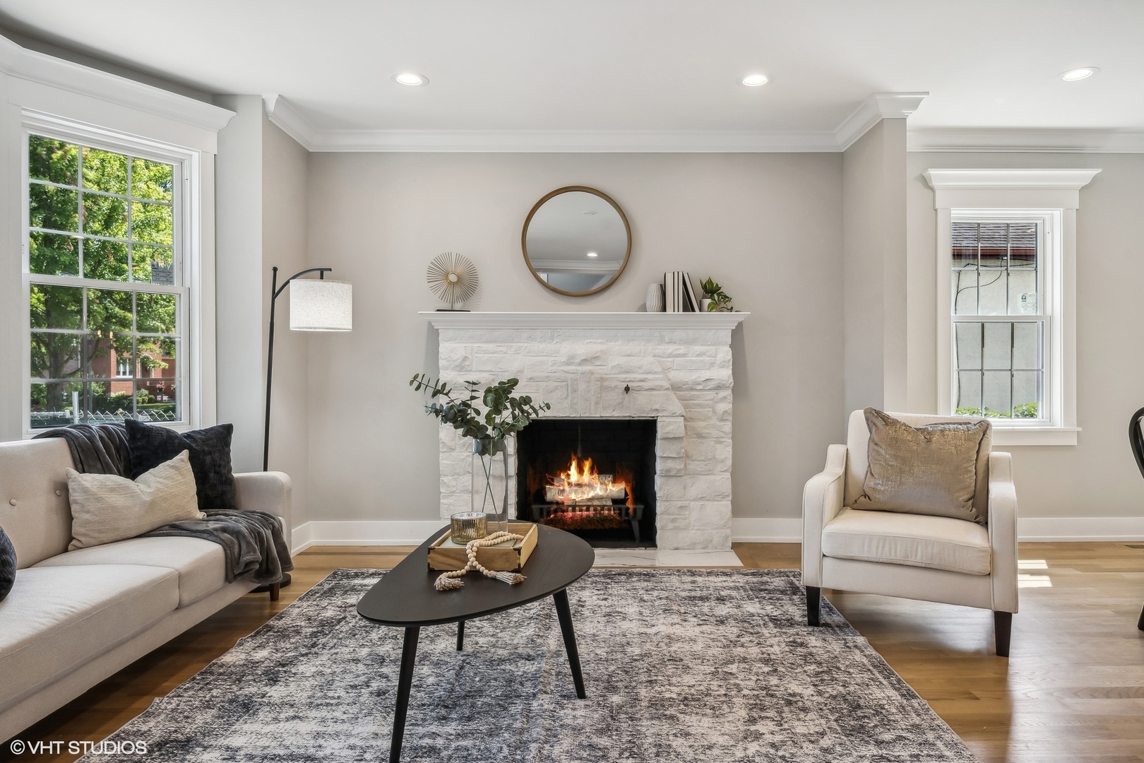 Undisclosed Address Elmhurst, IL 60126 - Photo 7 of 53 a living room with furniture a rug and a fireplace
