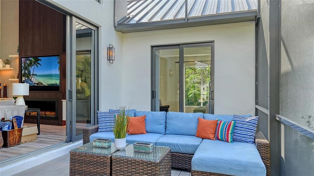 5035 Bay Shore Road Sarasota, FL 34234 - Photo 11 of 84 a living room with furniture and a window