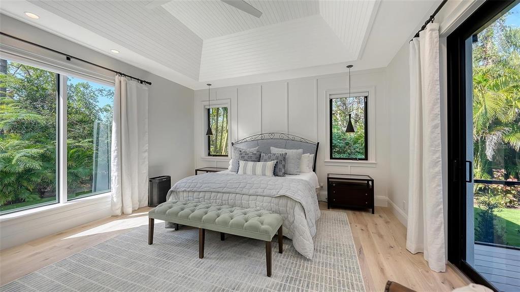 5035 Bay Shore Road Sarasota, FL 34234 - Photo 27 of 84 a bedroom with a bed and a large window