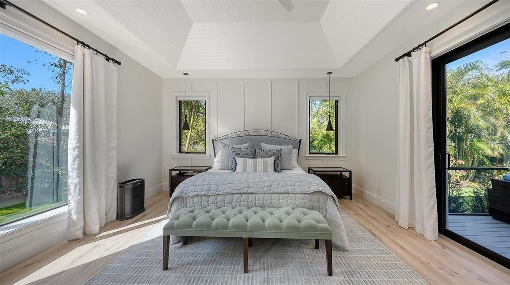 5035 Bay Shore Road Sarasota, FL 34234 - Photo 28 of 84 a bedroom with a bed and a window