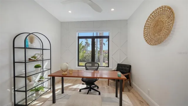 a view of a backyard with sitting area