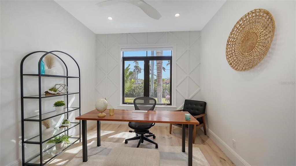 5035 Bay Shore Road Sarasota, FL 34234 - Photo 36 of 84 a workspace with furniture and a window