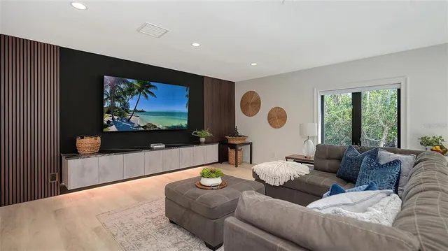 a bathroom with a double vanity sink a mirror and a shower