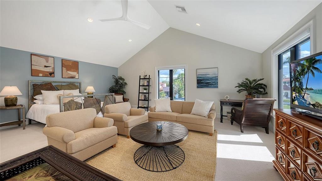 5035 Bay Shore Road Sarasota, FL 34234 - Photo 41 of 84 a living room with furniture a rug and a large window