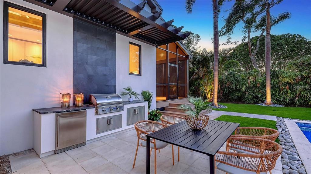 5035 Bay Shore Road Sarasota, FL 34234 - Photo 50 of 84 a view of a backyard with sitting area