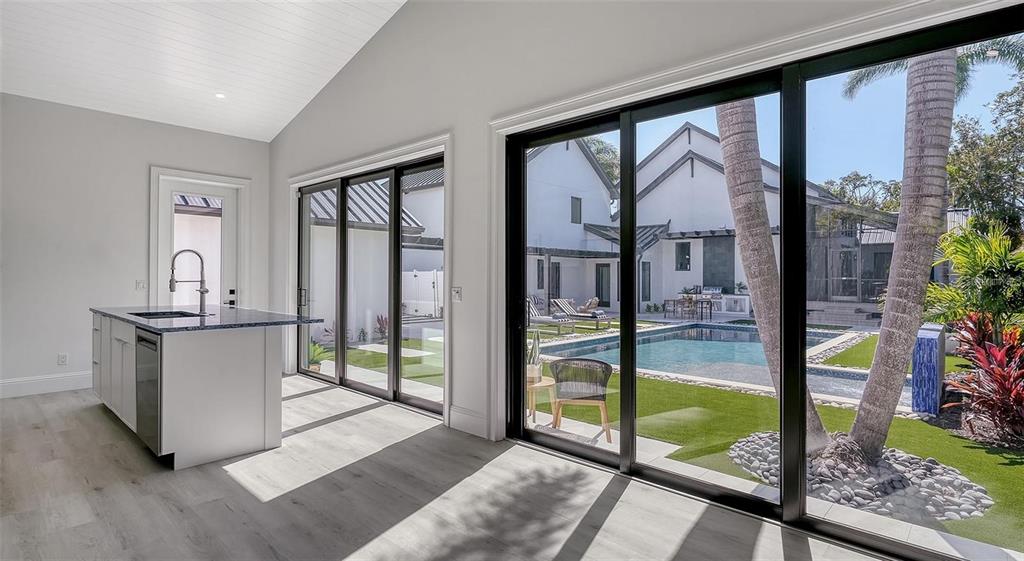 5035 Bay Shore Road Sarasota, FL 34234 - Photo 59 of 84 a view of living room kitchen and entryway