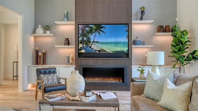 a living room with furniture and a window